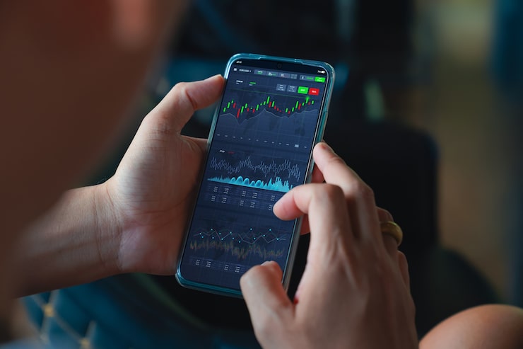 A smartphone displaying a simple stock market trading dashboard